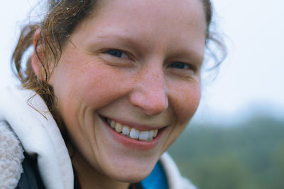 Close-up portrait of smiling girl