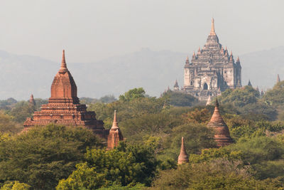 Temple against building