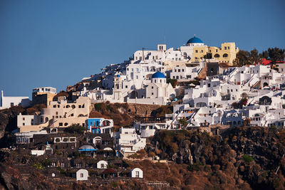 Panoramic aerial view of imerovigli village in santorini island, greece - traditional white houses