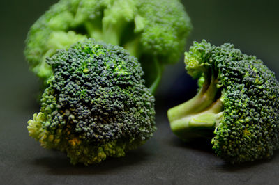 Close-up of dark green broccoli on table