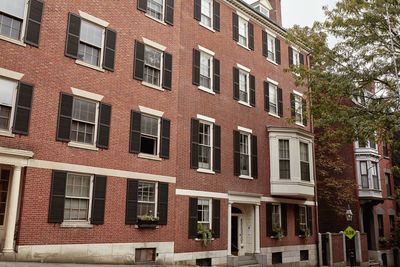 Brick brownstone buildings in the historic beacon hill neighborhood of boston, massachusetts 
