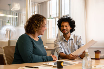 Business colleagues working in office