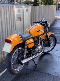 Motorcycle parked on street in city