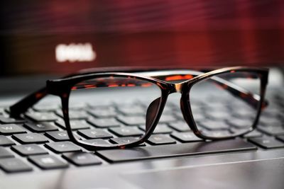 Close-up of eyeglasses on table
