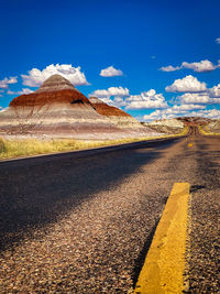 Scenic view of landscape against sky at petrified forest national park, united states.