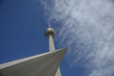 Low angle view of building against cloudy sky