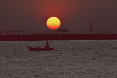 Scenic view of sea at sunset