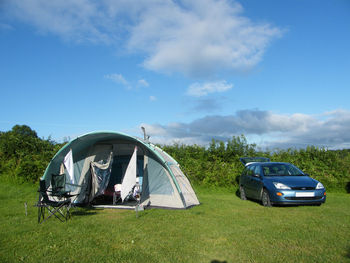 Car parked against blue sky