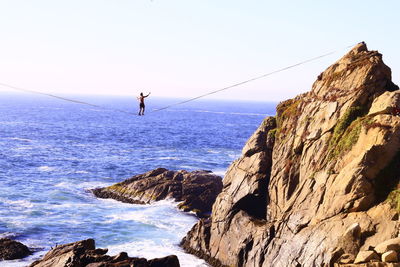 Panoramic view of sea against clear sky