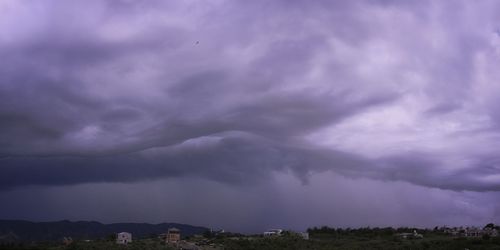 Storm clouds over landscape