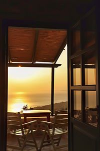 Built structure against sky at sunset