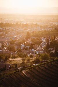High angle view of townscape against sky at sunset