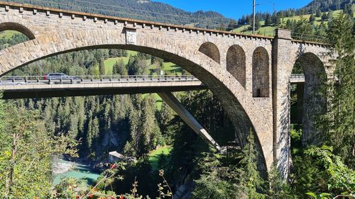 Arch bridge over river