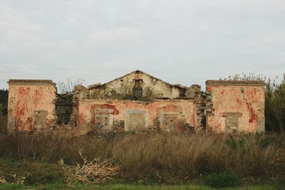 Abandoned building against sky