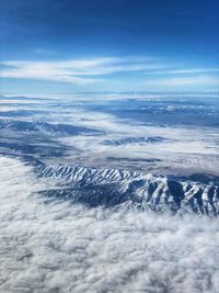 Aerial view of snow covered land