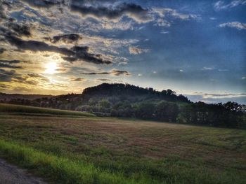 Scenic view of landscape against sky during sunset