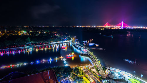 High angle view of illuminated city at night