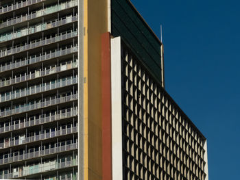 Low angle view of modern buildings against sky
