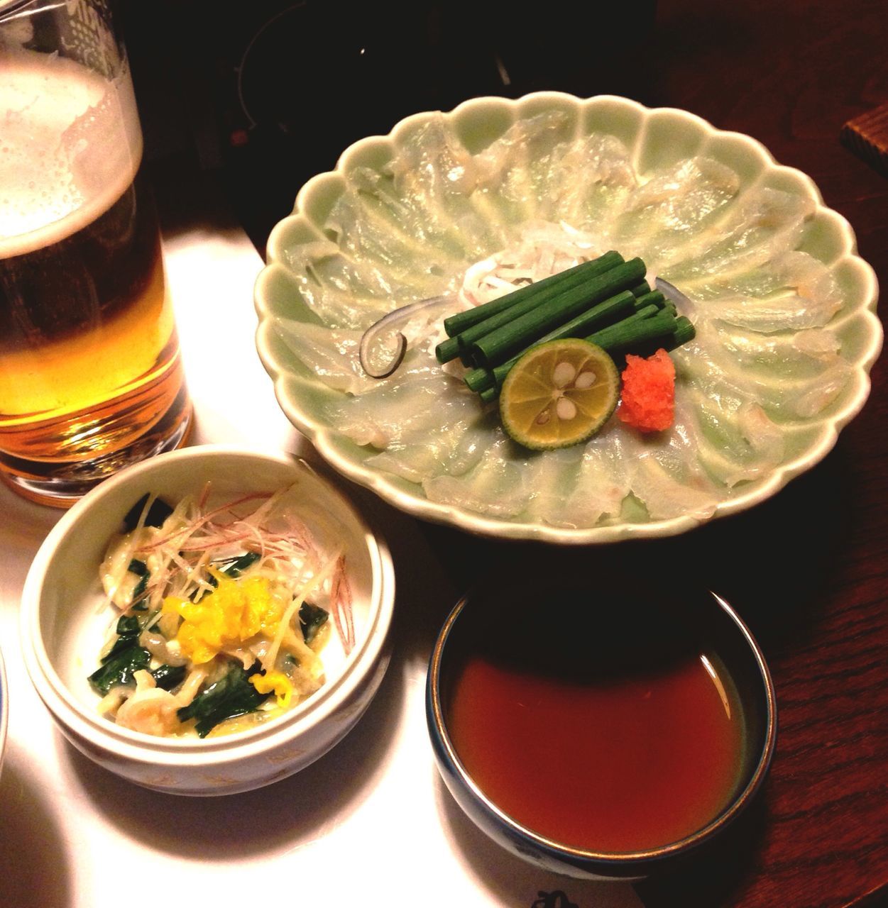 drinking glass, food and drink, high angle view, plate, drink, indoors, food, table, freshness, ready-to-eat, cocktail, serving size, close-up, no people, tea light