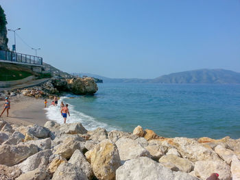 Scenic view of sea against clear blue sky