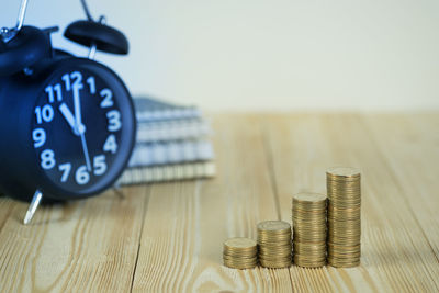 Close-up of coins on table