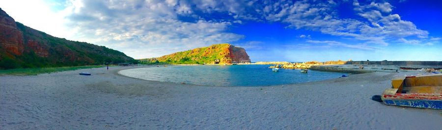 Scenic view of sea against blue sky