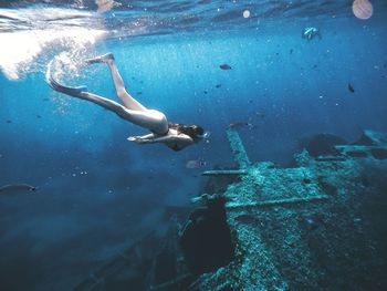 Woman swimming in sea