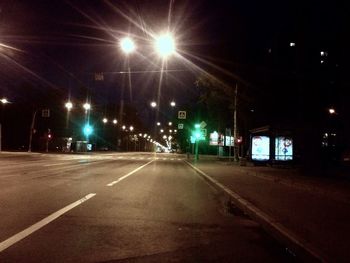 Illuminated road at night