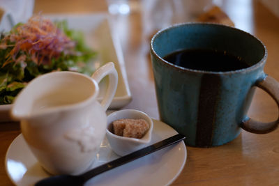 Close-up of coffee cup on table