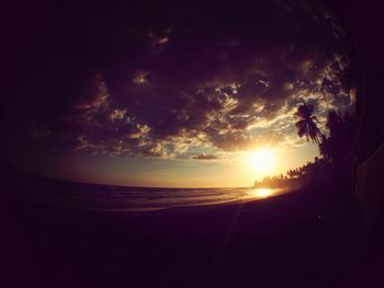 Scenic view of sea at sunset