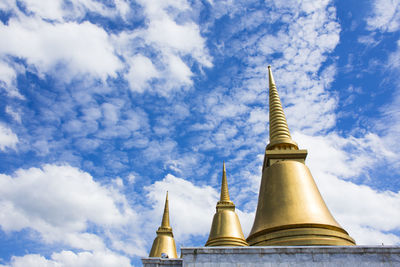 Golden pagoda in buddhist temple thailand.