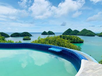 Scenic view of swimming pool against sky