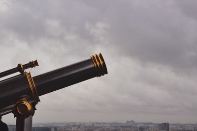 Low angle view of building against cloudy sky