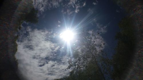 Sun shining through clouds