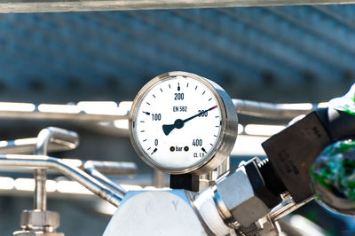 Close-up of pressure gauge in factory