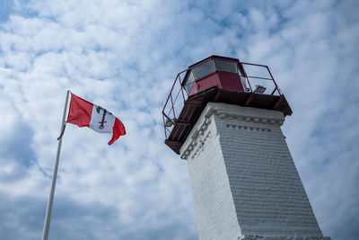 Low angle view of flag against sky