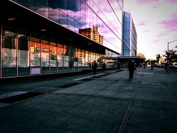 People walking on city street