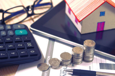 Close-up of coins on table