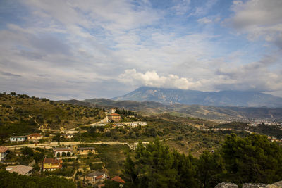 Aerial view of townscape against sky