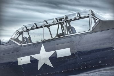 Low angle view of airplane against sky