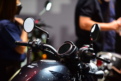 Close-up of motorcycle on street