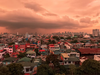 High angle view of townscape against sky during sunset