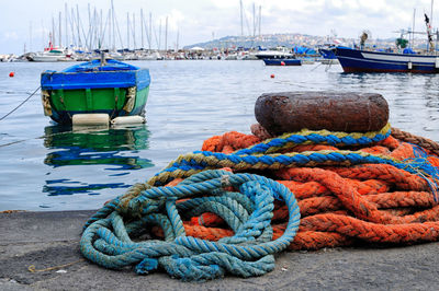 Ropes and boats at harbor