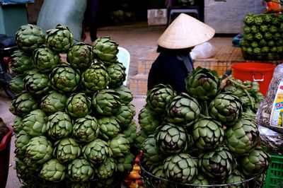 High angle view of fresh artichokes at market stall