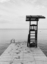 Pier on sea against sky