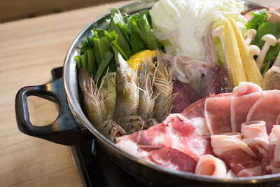 High angle view of chopped vegetables on table