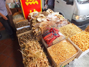 High angle view of food for sale in market dried fish