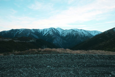 Scenic view of snowcapped mountains against sky