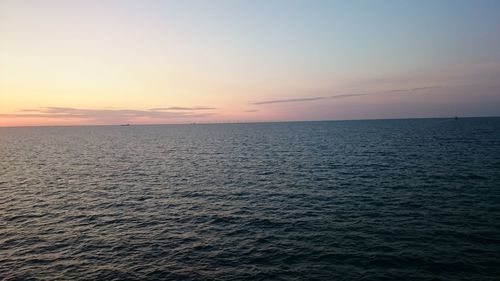 Scenic view of sea at sunset