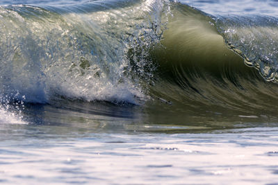 Close-up of water splashing in sea